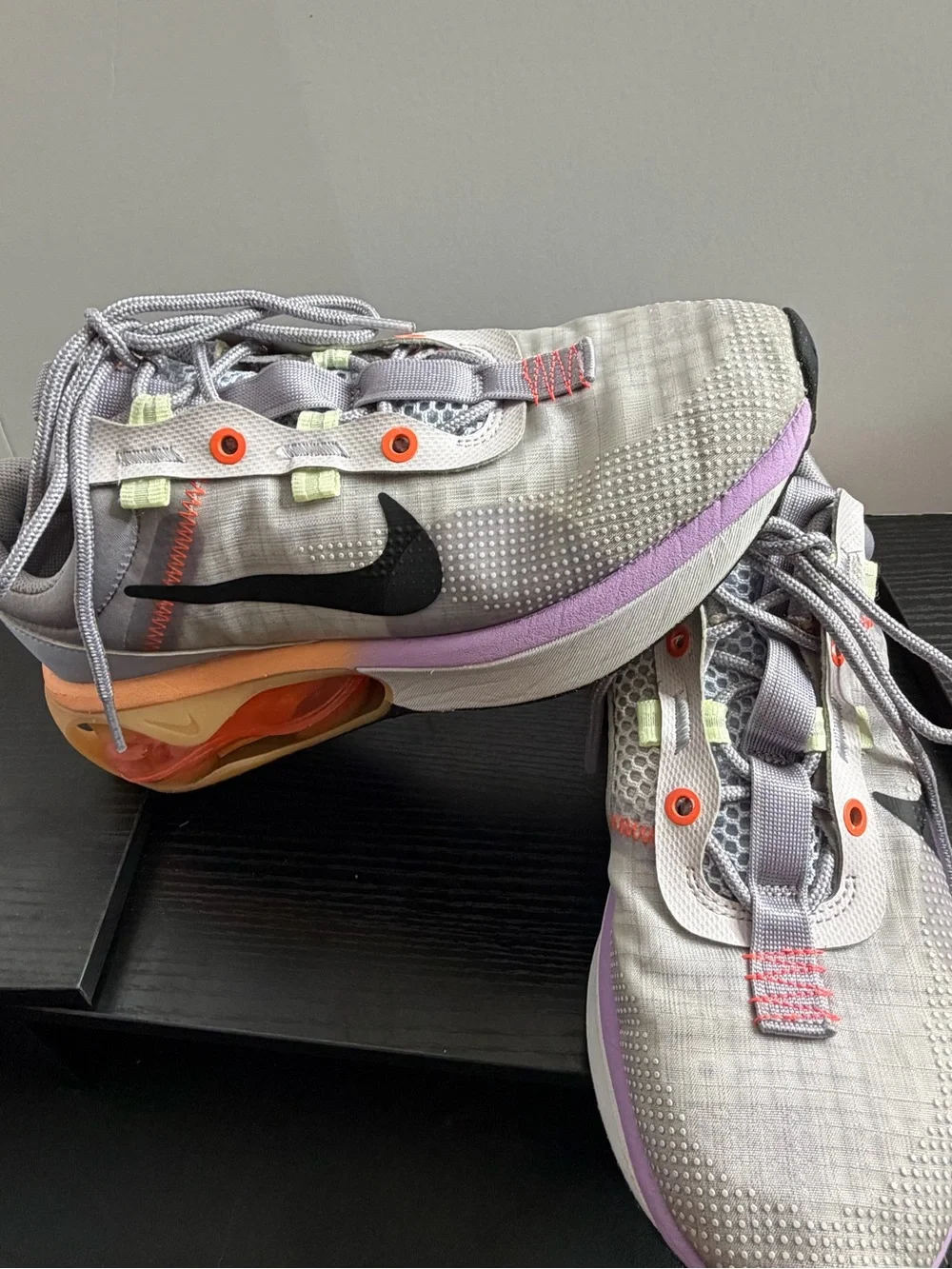 Nike Grey Athletic Sneakers with Black Swoosh and Orange Accents